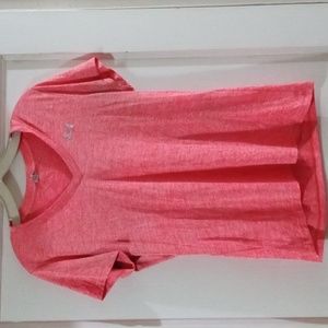 Girls Under Armour size medium orange short sleeve shirt